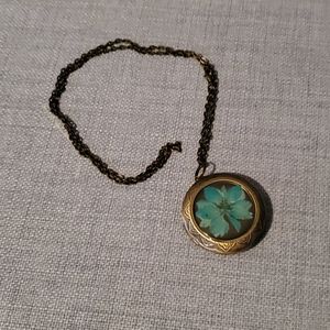 Antique locket with bees wax lip moisturizer